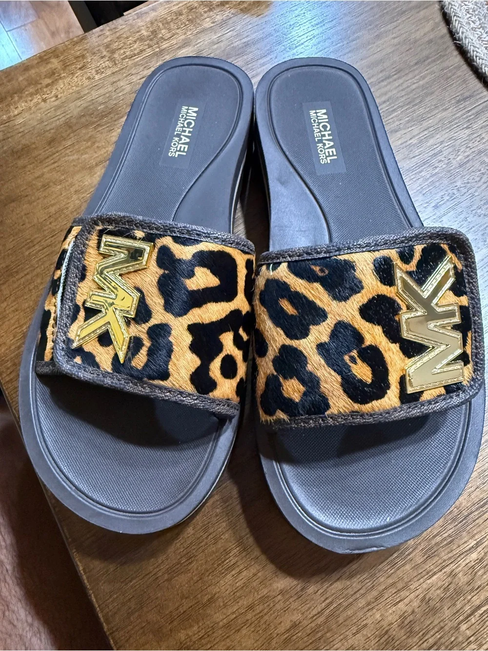 MICHAEL Michael Kors Black Footbed Leopard Print Slide Sandals with Gold MK Logo